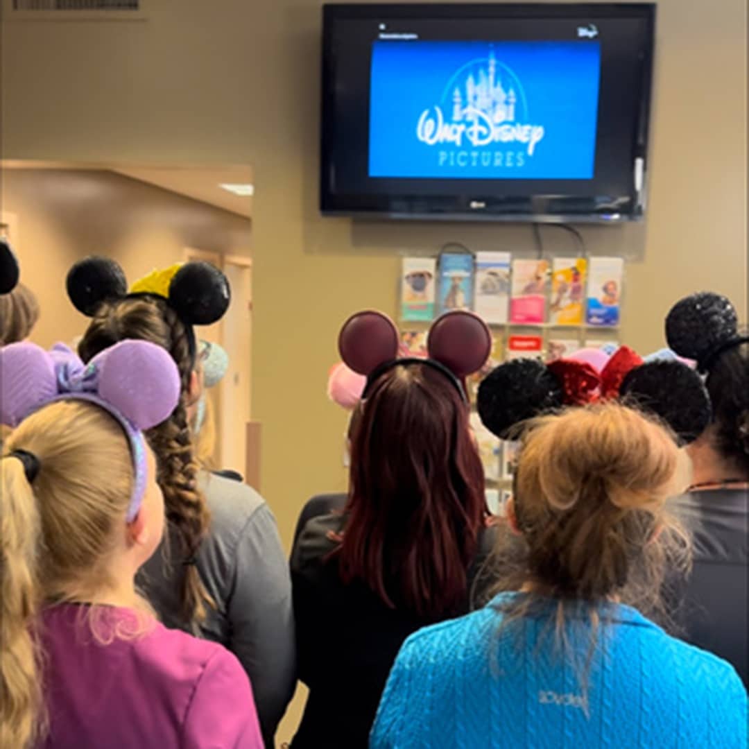 Big Creek Veterinary Hospital team wearing mouse ears