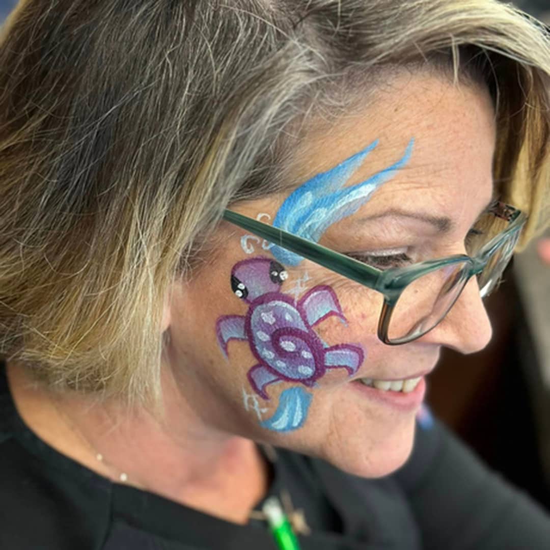 woman with face painting on